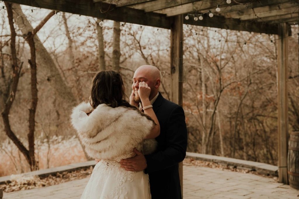 bride and groom looking at each other