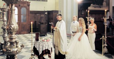 couple getting married in a church