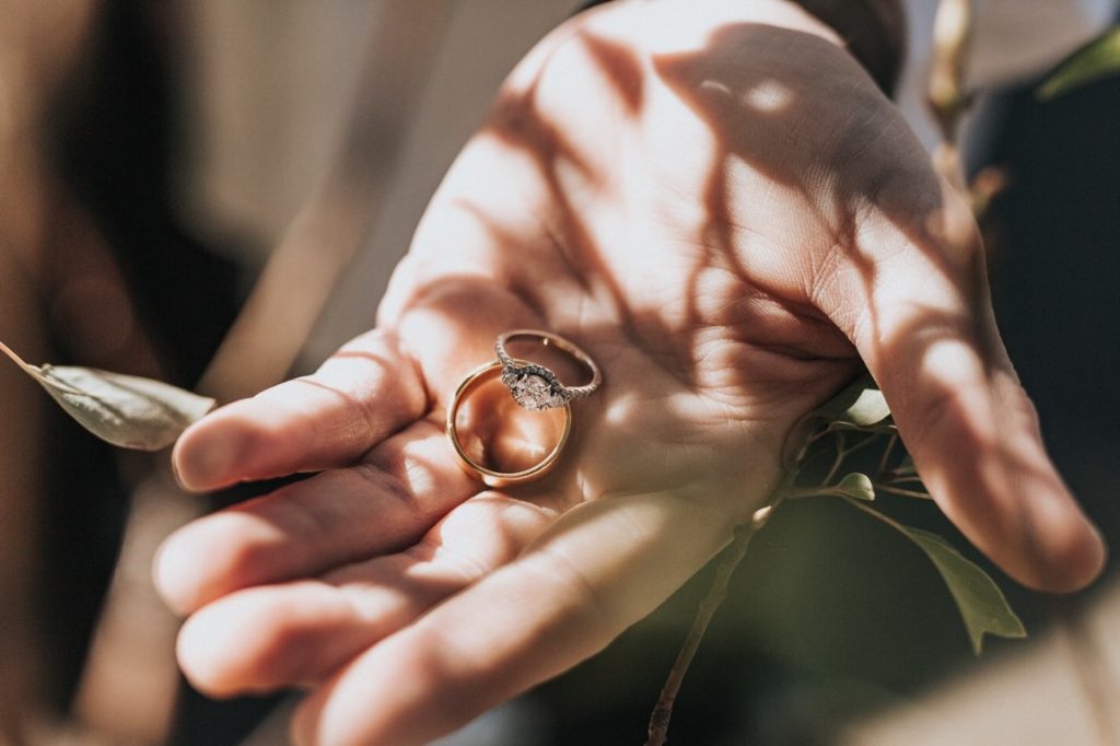 hand carrying wedding rings