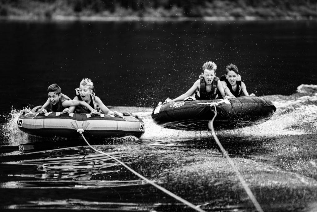 kids tubing on a river