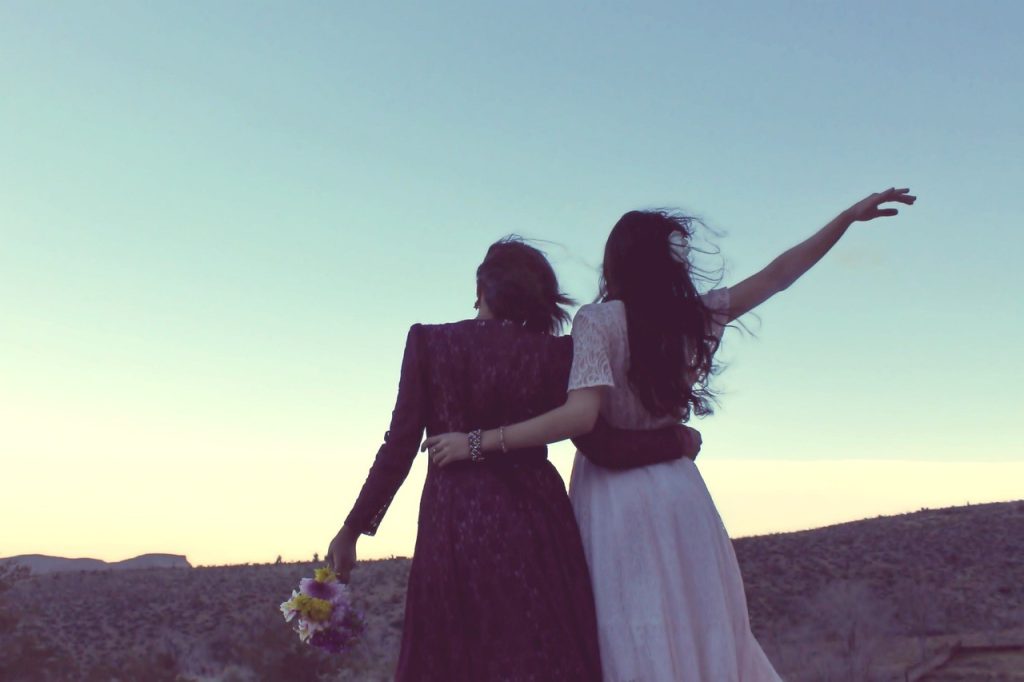 lesbian couple hugging each other