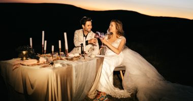 newlyweds drinking red wine