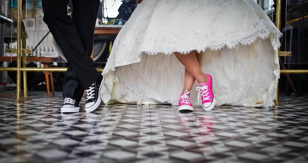 sneakers under formal attire