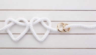 white rope and wedding rings