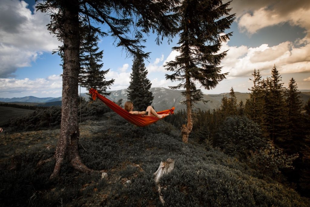 woman sitting on a hammock