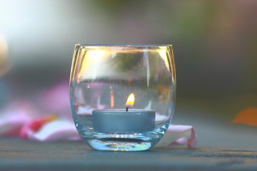 candle on glass