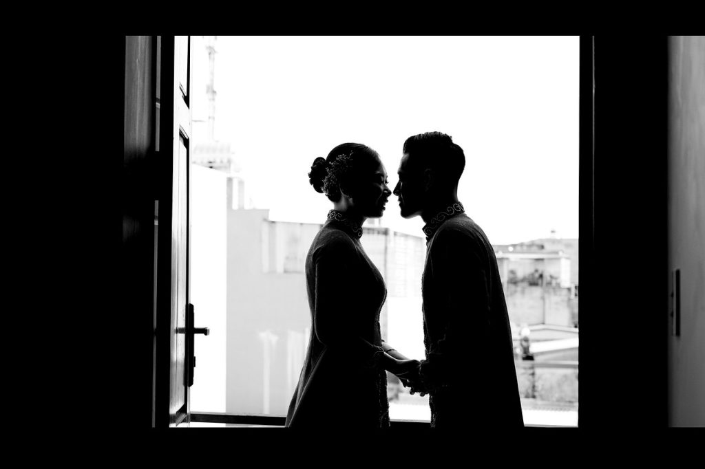 silhoutte of couple going for a kiss