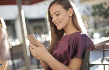 woman holding iphone