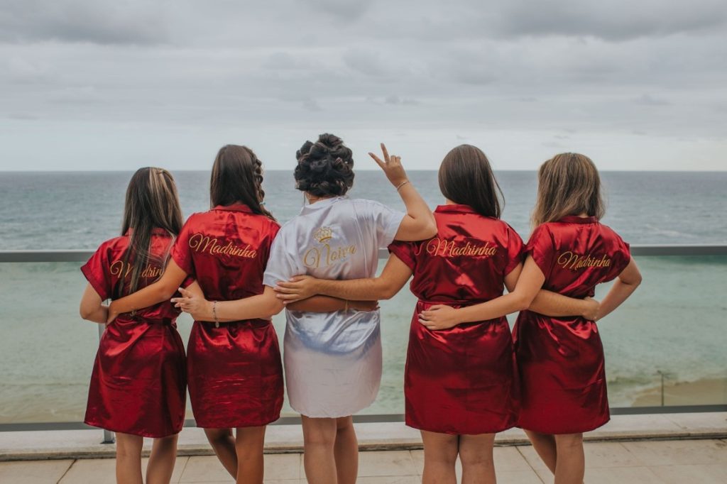 bride and bridesmaids wearing silk robes