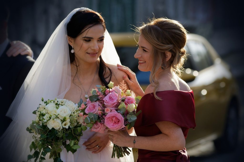 bride smiling with her friend