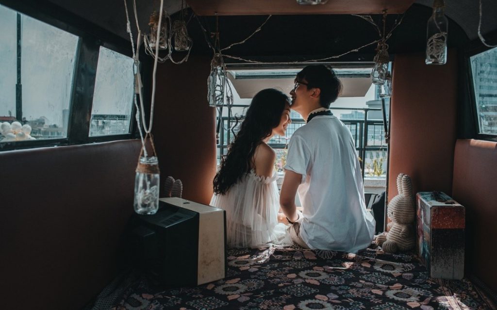 couple sitting on a van