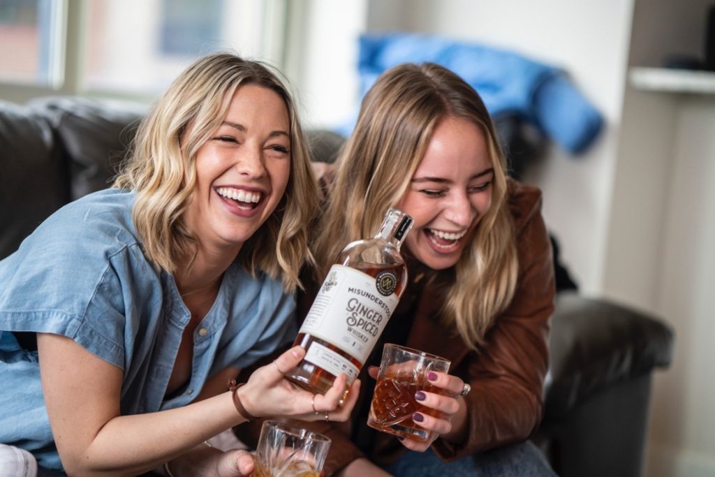 drunk women laughing together