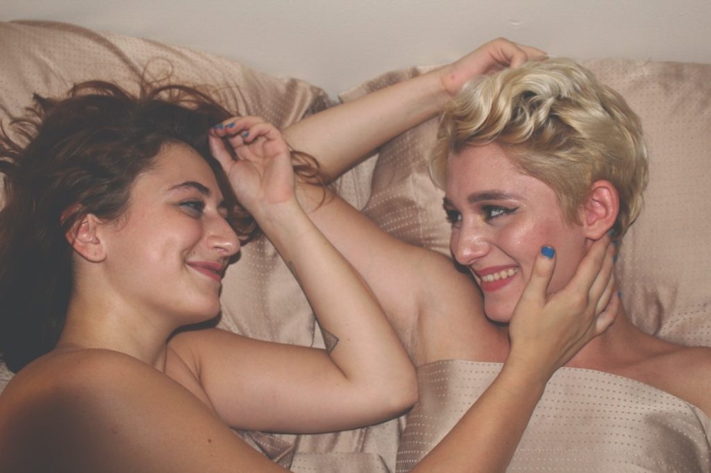 lesbian couple in bed