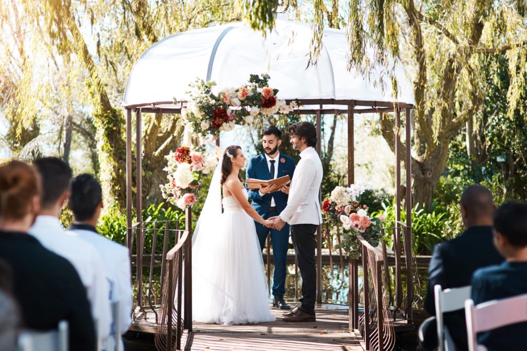 young man officiating friend's wedding