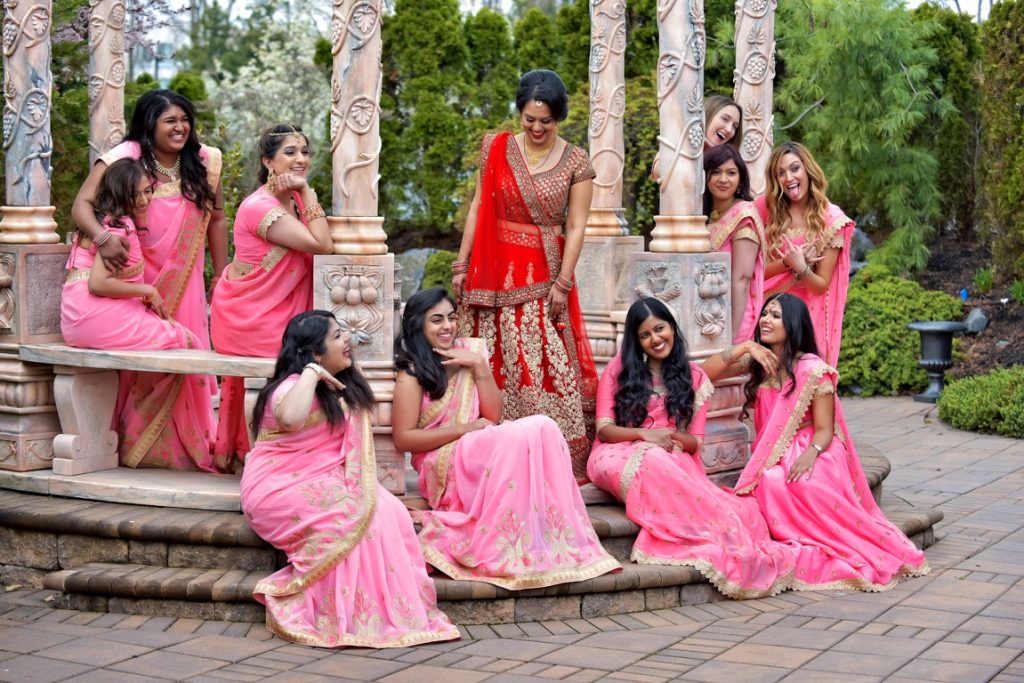 bride and bridesmaids having a photoshoot