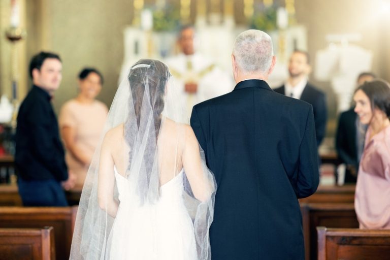 Why Do We Stand For The Bride? Tradition Explained