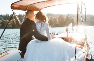 bride and groom on a boat