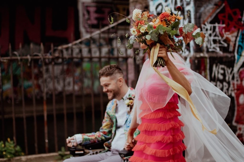 bride and groom wearing colorful clothes