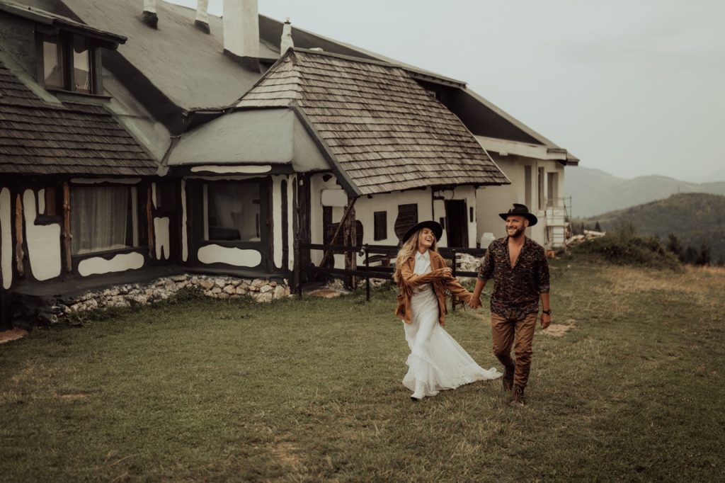 newlyweds wearing fedoras