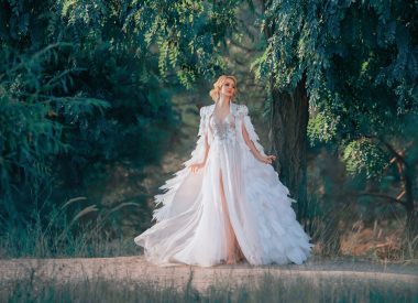 wedding dress with feather cloak