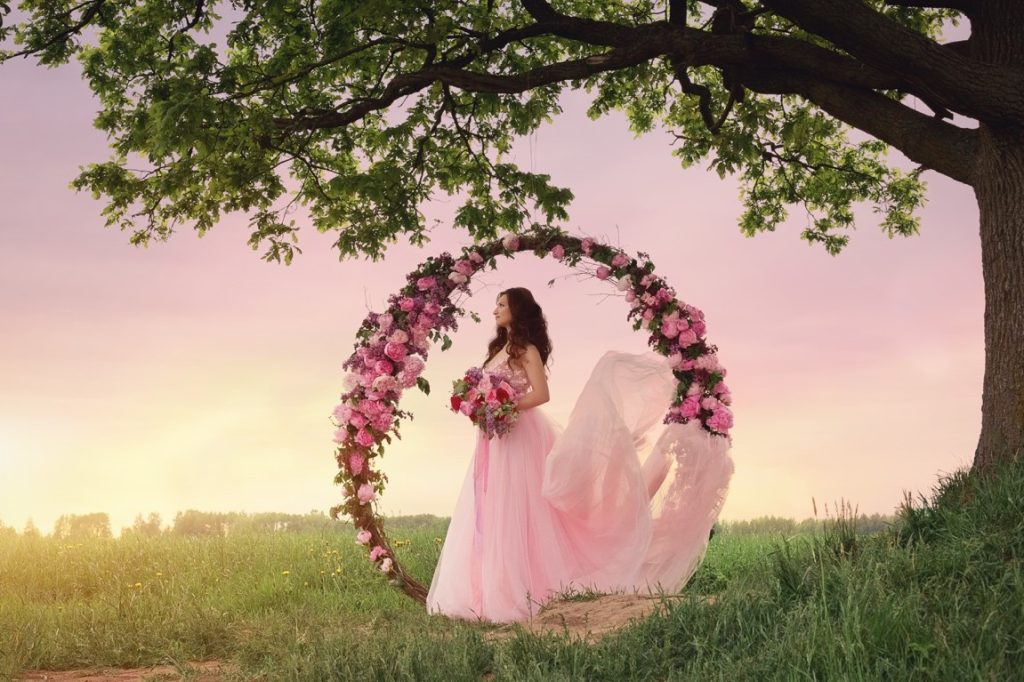 wedding arch with pink flowers