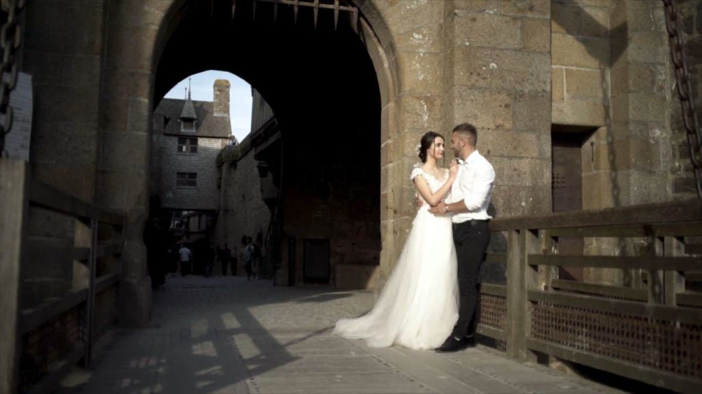 bride and groom at a castle