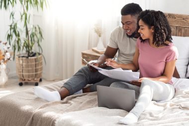 couple sorting out wedding budget