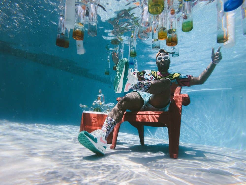 man with alcohol underwater