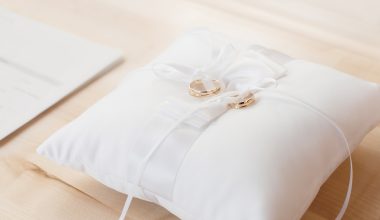 wedding ring on pillow