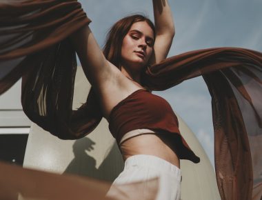woman wearing red crop top
