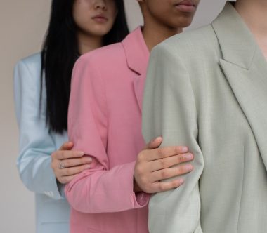 women wearing colored blazers