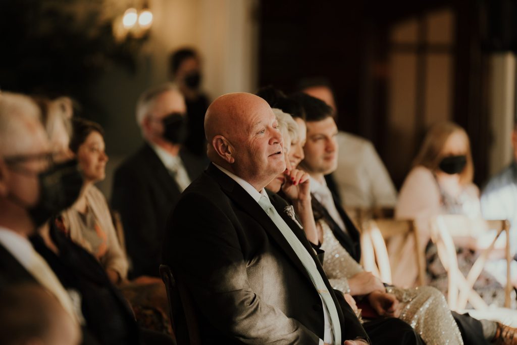 emotional parents at a wedding