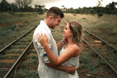 man and woman on a railway
