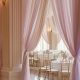 indoor pastel-themed wedding reception